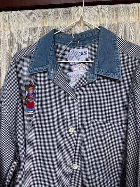 Large blue checkered button-down with denim collar, embroidered garden girl on front, and gardening tools + flowers embroidery on back.